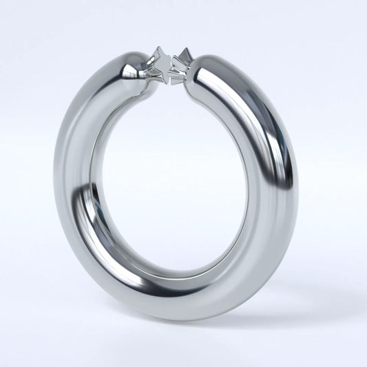 Sterling silver ring shaped like a sausage bent into a circle on a light grey background